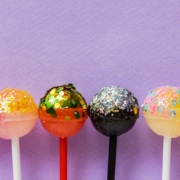 Assorted lollipops with glitter on them