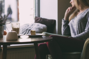 woman sitting at cafe