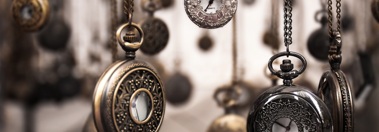 pocket watches hanging on chains