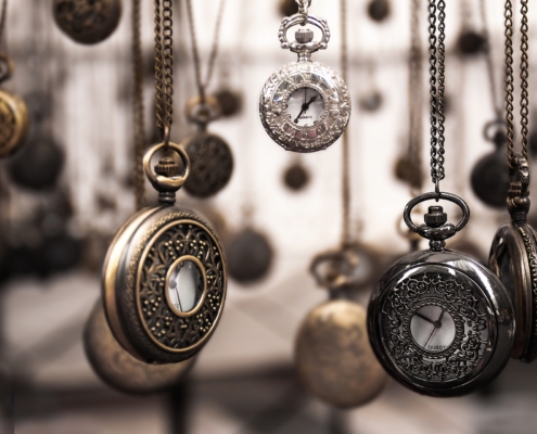 pocket watches hanging on chains