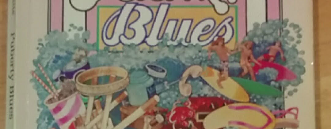 Top half of book cover with title "Puberty Blues"
